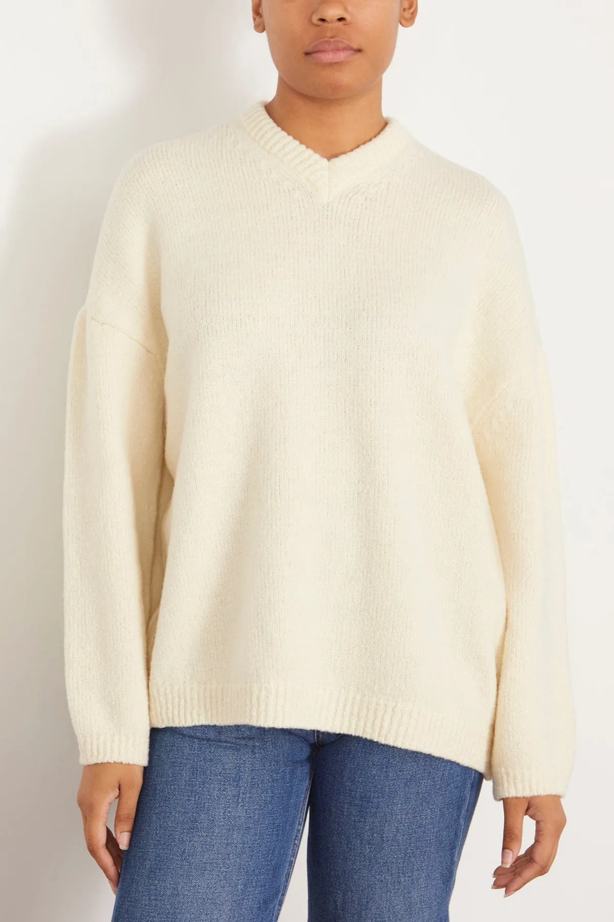 Asymmetric V Neck Merino Sweater in Off White